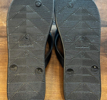 Chinelo Toro Logo preto